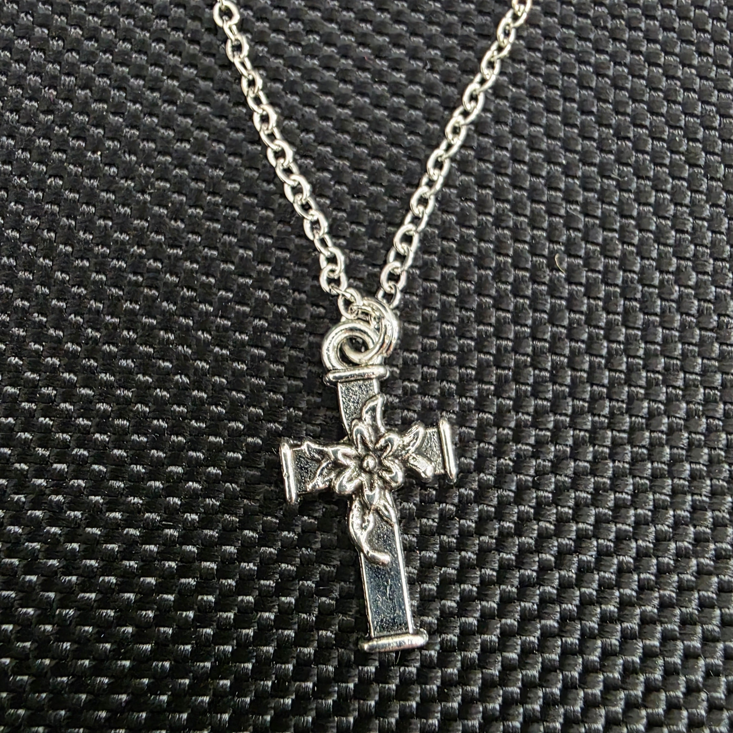 Cross with flower necklace