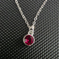 Dark red gem necklace