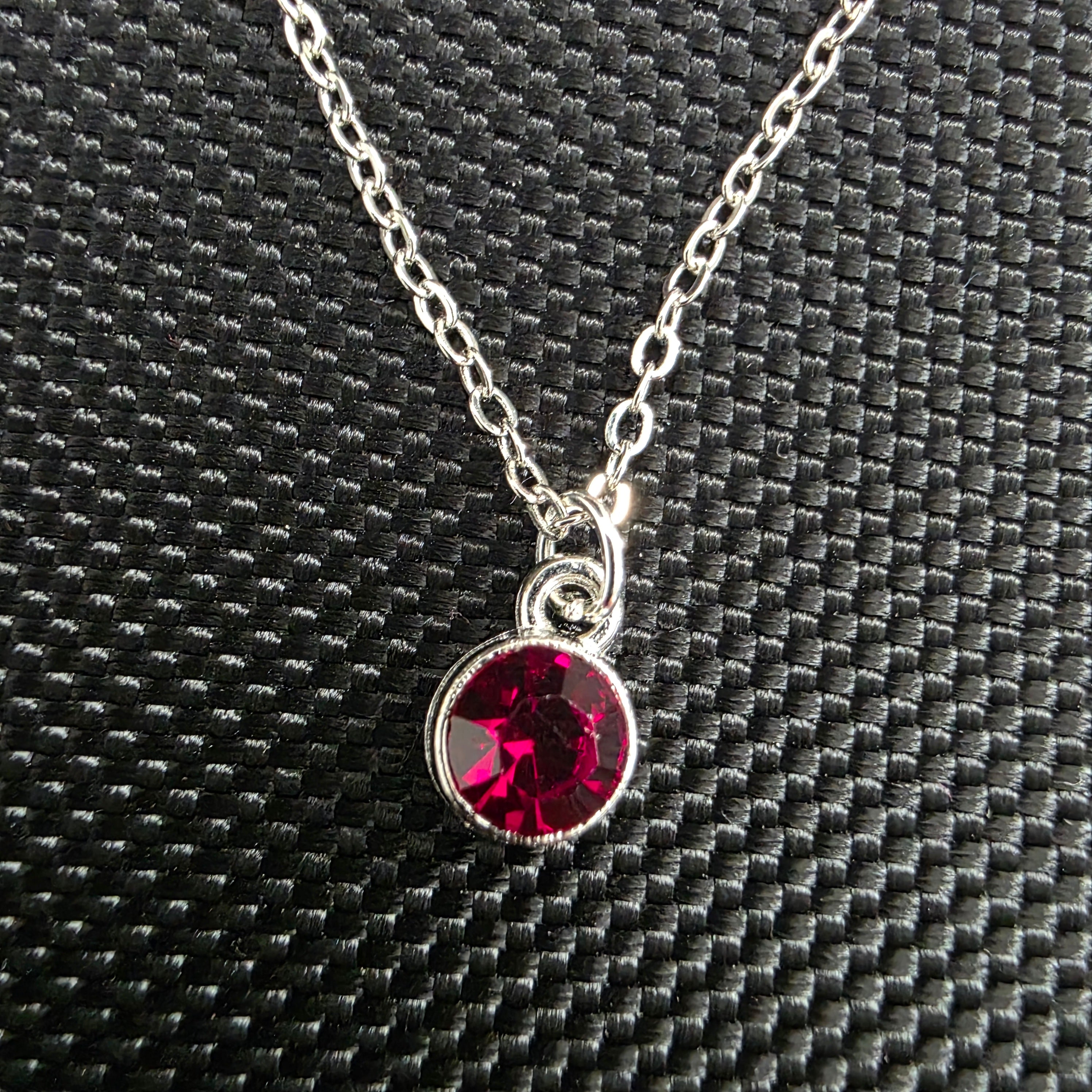 Dark red gem necklace