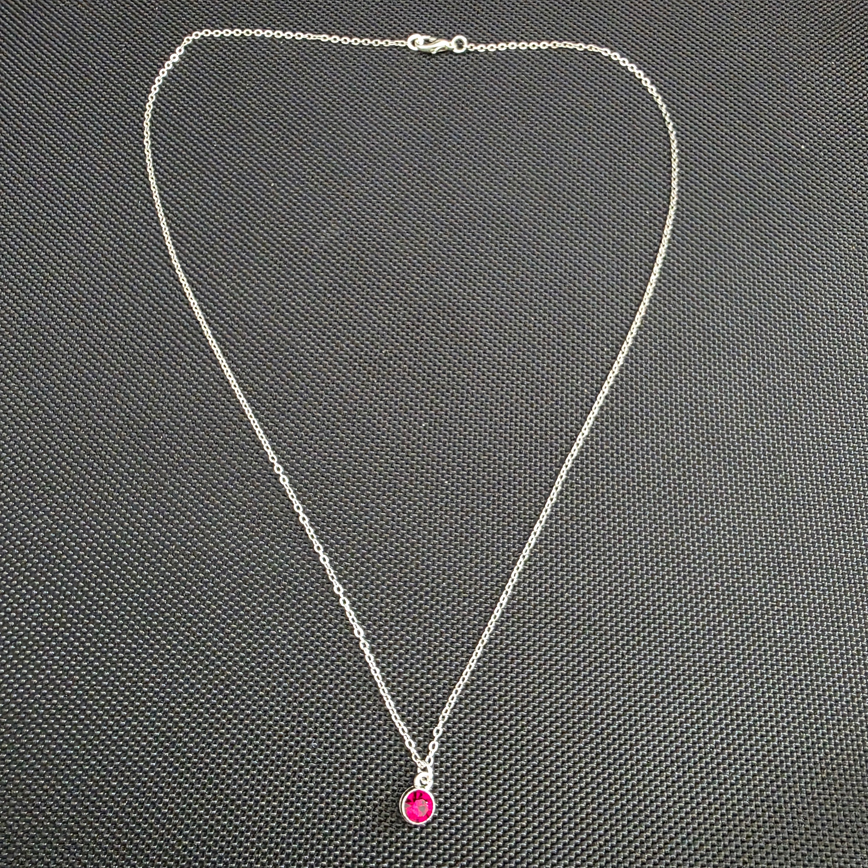 Dark red gem necklace