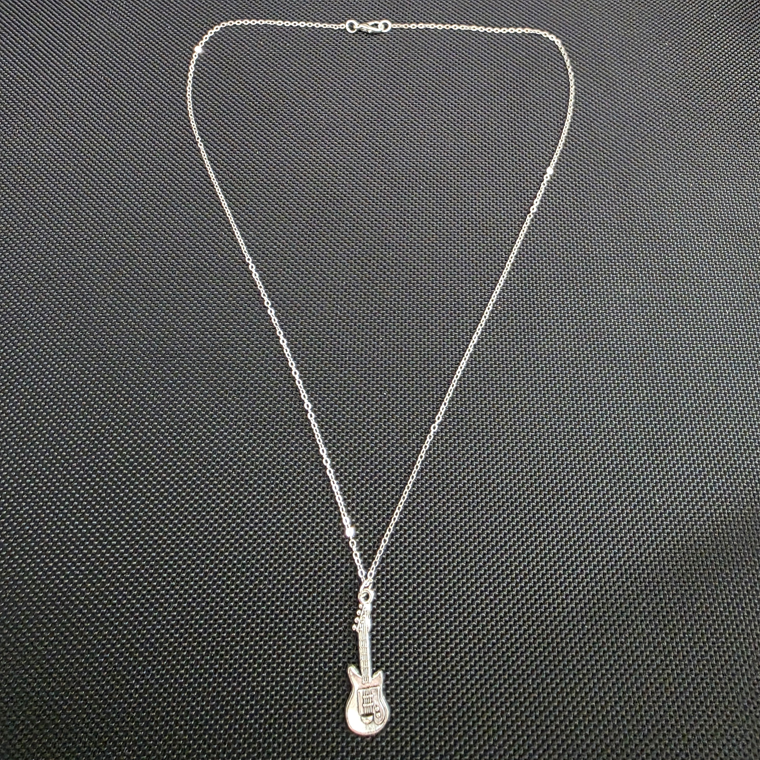Guitar necklace
