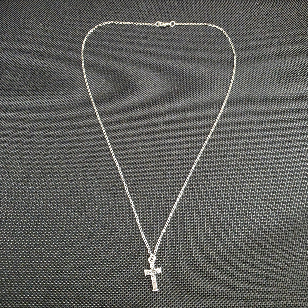 Cross with flower necklace